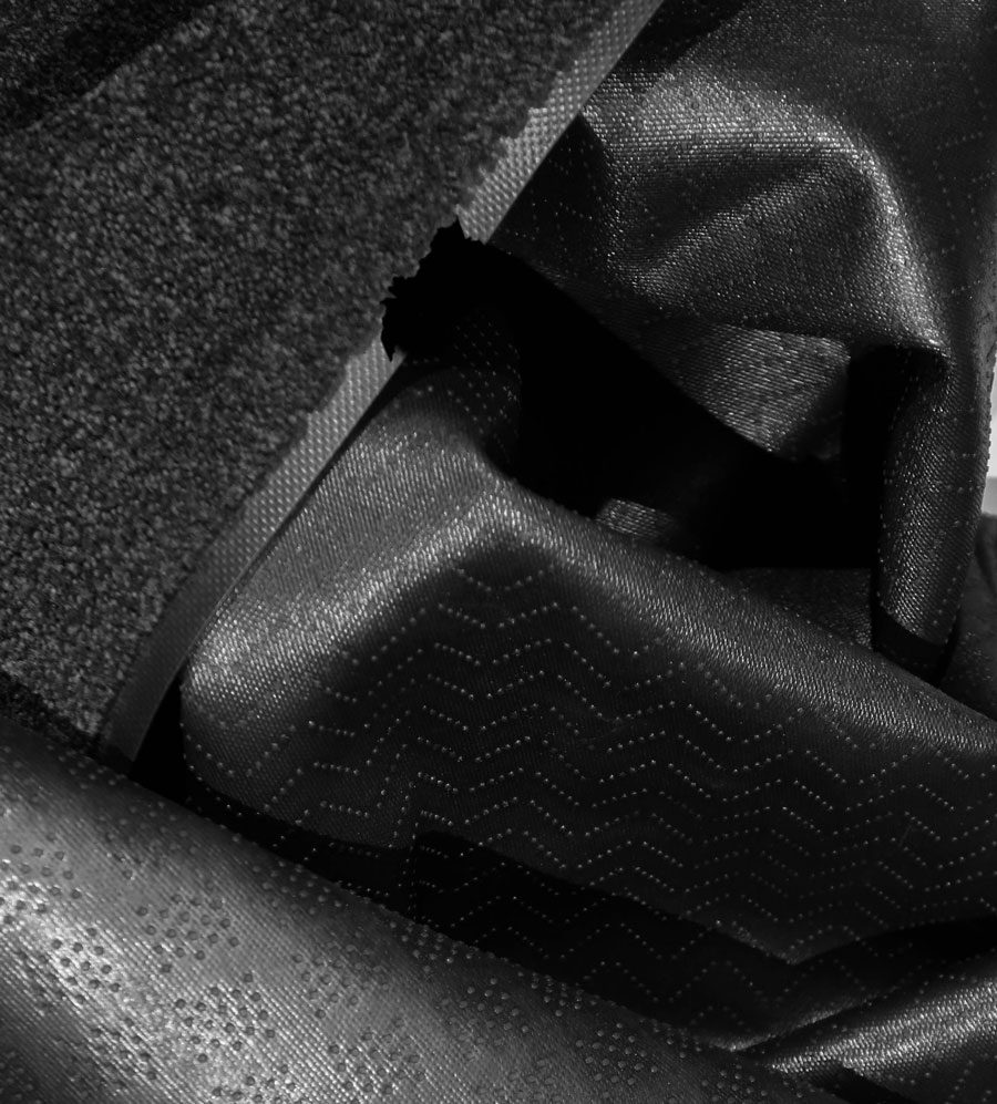 A pile of removed mat borders — rubber waste kept out of the landfill